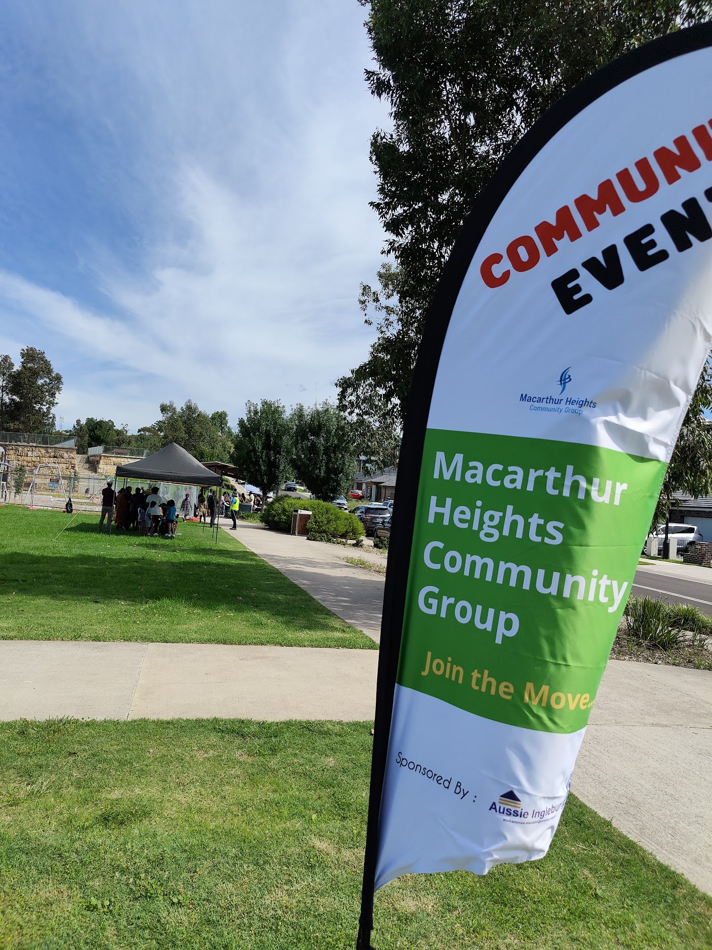 MHCG community event flag on the footpath